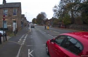 SL10 HFB | A644 Huddersfield Road : Dangerous close pass at traffic island