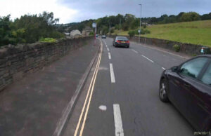 AG58 SVE | Close passed in cycle lane by red Ford Focus on Wakefield Road
