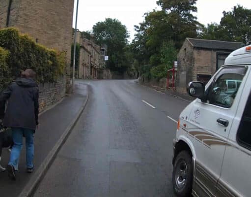 V900 DGE | White Dodge Ram squeezes cyclist on “Red Rooster” (A6025)