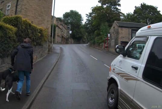 V900 DGE | White Dodge Ram squeezes cyclist on “Red Rooster” (A6025)